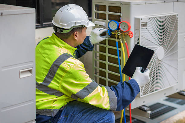 Professional Air Duct Cleaning technician working in Altus, AR
